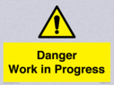gender-neutral-construction-warning-sign-danger-work-in-progress-with-exclamatio~